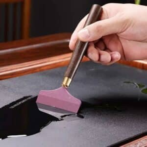 Spatule à colle pour cuir